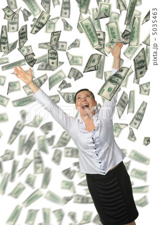 The woman and is a lot of money falling from above 5035463