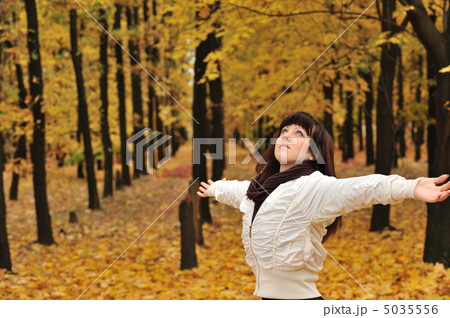 The girl in an autumn forest The girl in an autumn forest 5035556