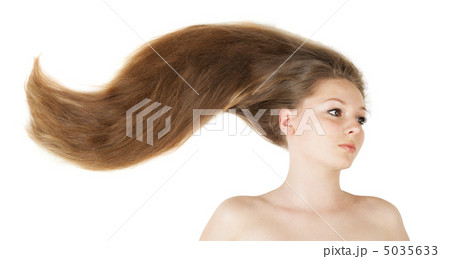 Healthy beautiful long hair closeup in motion created by wind Healthy beautiful long hair closeup in motion created by wind 5035633