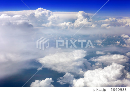View above the earth at the clouds below. 5040983