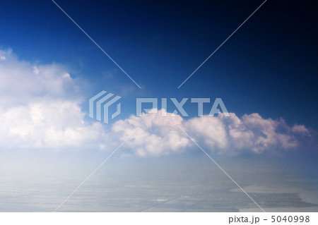 View above the earth at the clouds below. View above the earth at the clouds below. 5040998