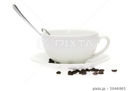 cup and saucer and coffee beans isolated on white 5046965