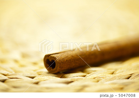 cinnamon sticks on a wicker mat cinnamon sticks on a wicker mat 5047008