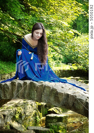 medieval princess on stone bridge medieval princess on stone bridge 5050192