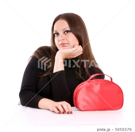young woman with red cosmetic bag 5050370