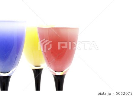 glasses with different colored drinks isolated on white 5052075