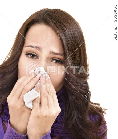 Sick woman with handkerchief having cold. Sick woman with handkerchief having cold. 5056001