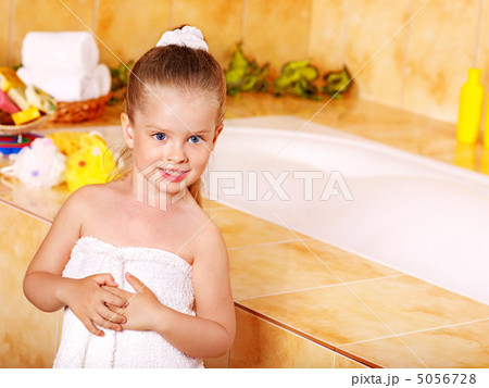 Child washing in bubble bath . 5056728