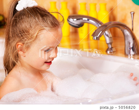 Kid washing in bath. 5056820