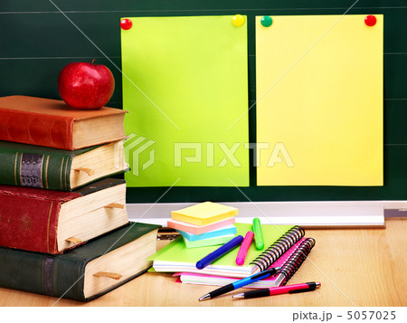 Books and blackboard. School supplies. Books and blackboard. School supplies. 5057025