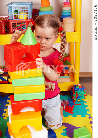 Child preschooler play block in playroom. Child preschooler play block in playroom. 5057156