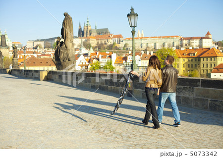 young couple on the Charles Bridge on the skyline 5073342
