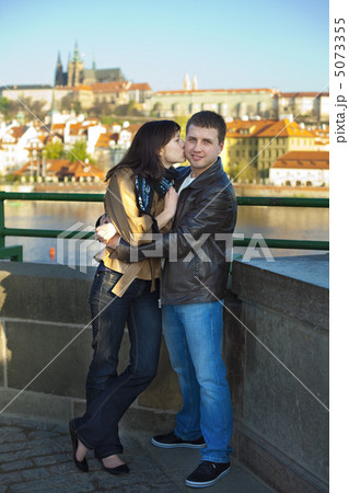 young couple on the Charles Bridge on the skyline 5073355