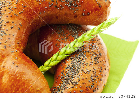 bread with poppy seeds and the spike isolated on white bread with poppy seeds and the spike isolated on white 5074128