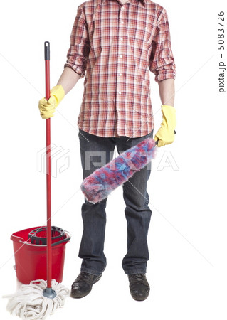 Young sweeping man workwear. Isolated Young sweeping man workwear. Isolated 5083726