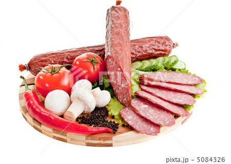 sliced sausage with vegetables and red papper sliced sausage with vegetables and red papper 5084326