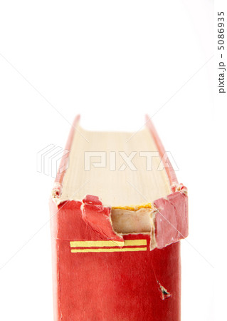 tattered book isolated on white background tattered book isolated on white background 5086935