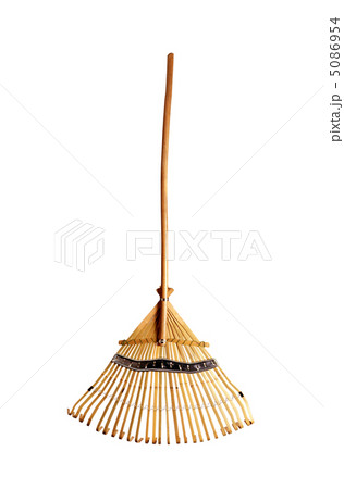 wooden rake isolated on the white background 5086954