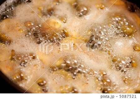 bananas in the pan in boiling caramel bananas in the pan in boiling caramel 5087521