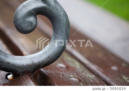 Detail of the benches with rain drops Detail of the benches with rain drops 5091024
