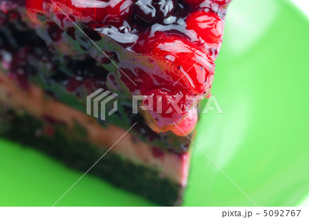 beautiful cake with berries on a plate isolated on white 5092767