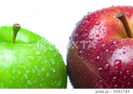 apple with water drops isolated on white apple with water drops isolated on white 5092784