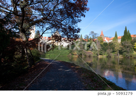 beautiful autumn landscape with colorful trees, a pond and a med beautiful autumn landscape with colorful trees, a pond and a med 5093279