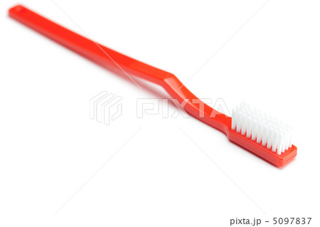 red toothbrush isolated on white 5097837