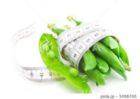 peas and measure tape isolated on white peas and measure tape isolated on white 5098700