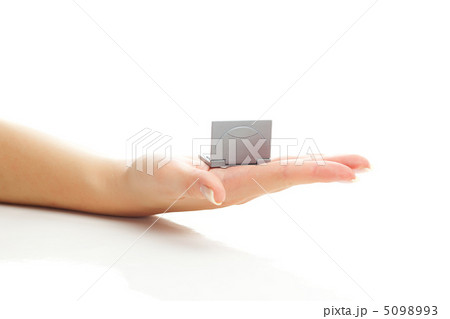 miniature laptop in hand isolated on white miniature laptop in hand isolated on white 5098993