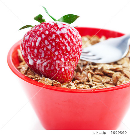 strawberry,milk,fork and wheat in a bowl isolated on white strawberry,milk,fork and wheat in a bowl isolated on white 5099360