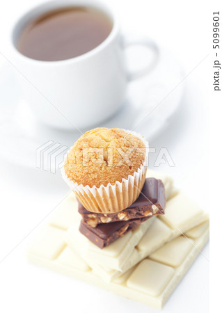 bar of chocolate,tea and muffin isolated on white bar of chocolate,tea and muffin isolated on white 5099601