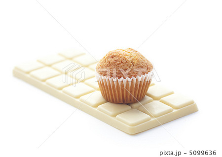 bar of white chocolate and muffin isolated on white 5099636