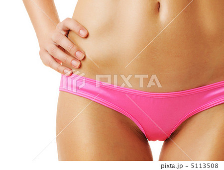 Sexy tan woman in bikini close-up 5113508