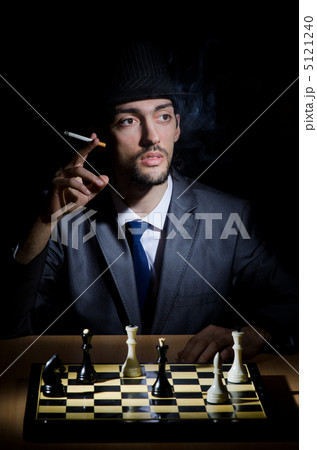 Chess player playing his game Chess player playing his game 5121240