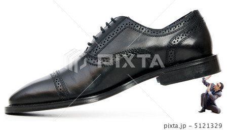 Woman domination concept with shoes and man Woman domination concept with shoes and man 5121329