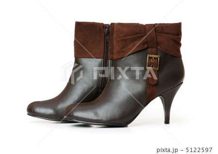 Brown boots isolated on the white background Brown boots isolated on the white background 5122597