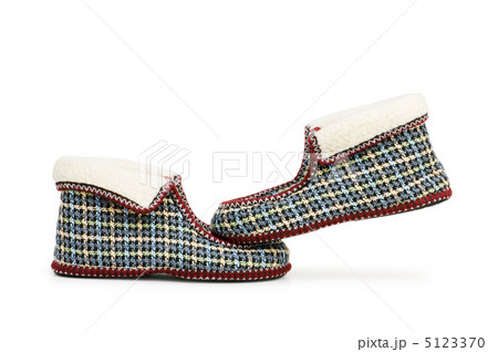 Warm slippers isolated on the white background 5123370