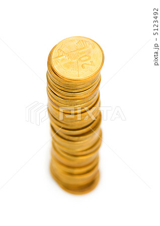 Stack of coins isolated on the white Stack of coins isolated on the white 5123492