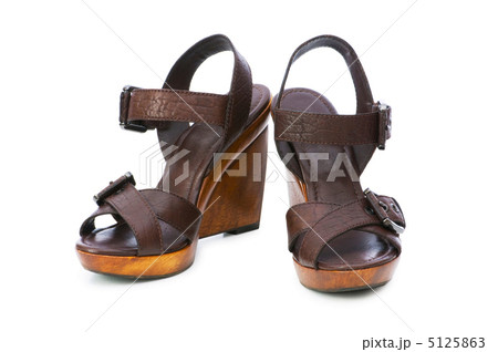Woman shoes isolated on the white background Woman shoes isolated on the white background 5125863