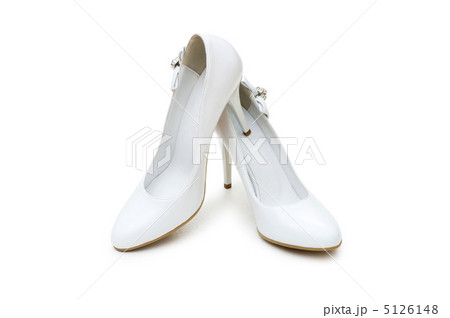 Woman shoes isolated on the white background Woman shoes isolated on the white background 5126148