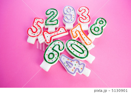 Birthday candles against colourful background 5130901