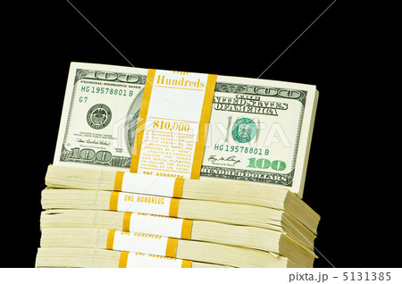 Stack of dollars isolated on the black 5131385