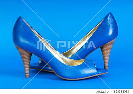 Fashion concept with blue woman shoes on high heels 5133842