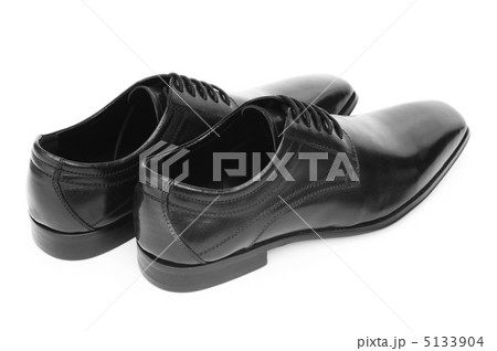 Male shoes isolated on the white background Male shoes isolated on the white background 5133904