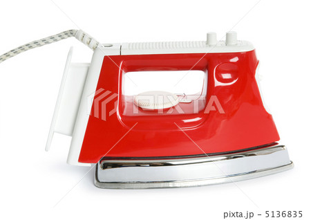 New iron isolated on the white background New iron isolated on the white background 5136835