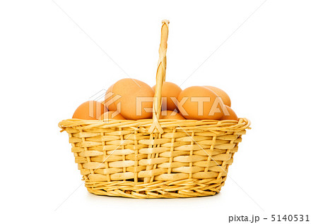 Basket full of eggs isolated on white 5140531
