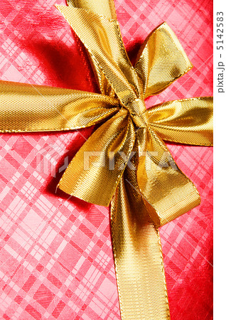Celebration concept - Gift box against colorful background Celebration concept - Gift box against colorful background 5142583