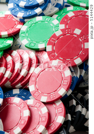 Stack of various casino chips - gambling concept 5144429