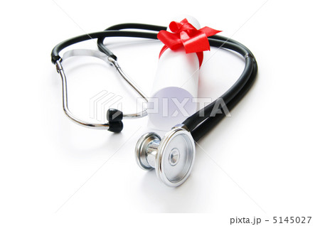 Education concept with diploma and stethoscope on white Education concept with diploma and stethoscope on white 5145027